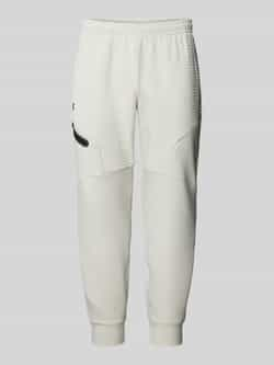 Under Armour Relaxed fit sweatpants met ritszak