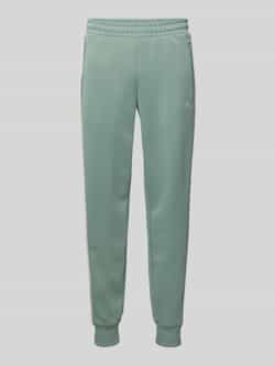 PUMA PERFORMANCE Sweatpants met labelprint