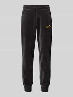PUMA PERFORMANCE Relaxed fit sweatpants met labelstitching model 'Velvettrack'