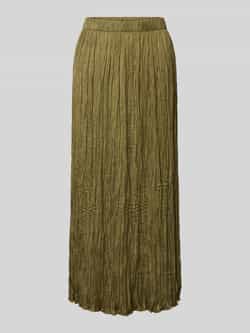 Oui Midirok in geplooide look