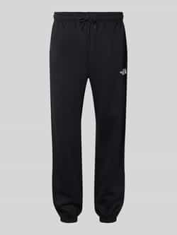 The North Face Regular tapered fit sweatpants met labelprint