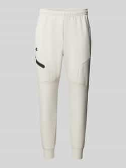 Under Armour Regular fit sweatpants met ritszak model 'UNSTOPPABLE'