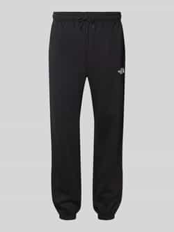 The North Face Regular tapered fit sweatpants met labelprint
