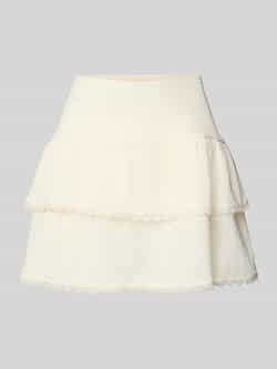Review Minirok in laagjeslook met kant
