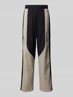 EA7 Emporio Armani Wide leg trainingsbroek met labelbadge model 'TRAIN 7.0'