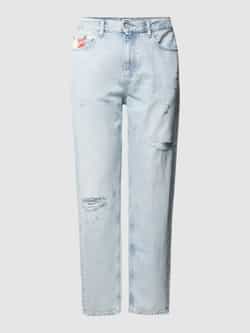 Tommy Jeans Relaxed tapered fit jeans in destroyed-look model 'ISAAC'