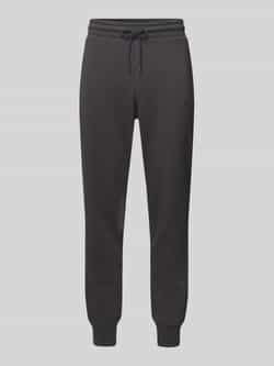 PUMA PERFORMANCE Tapered fit sweatpants met labelprint