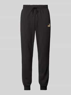 PUMA PERFORMANCE Relaxed fit sweatpants met labelprint