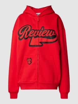 Review Sweatjack met labelprint met statement