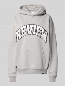 Review Oversized hoodie met labelprint