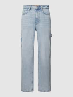 REVIEW Jeans in smal model met knoop- en ritssluiting