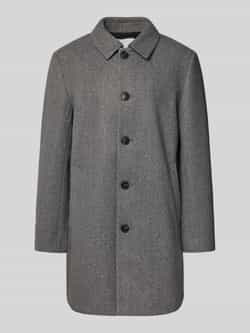 REVIEW Lange jas met steekzakken