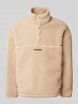 REVIEW Sherpa jacket met labelpatch