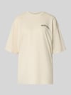 REVIEW Oversized T-shirt met statementprint Zand