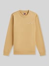 Tommy Jeans Bluza o kroju regular fit z małym napisem z logo Beżowy