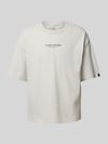 Alpha Industries T-shirt z nadrukiem z logo model ‘Studio Edition’ Jasnoszary melanż
