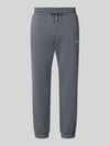 JACK & JONES Spodnie dresowe o kroju straight fit z mieszanki bawełny model 'Kane' Jasnoszary