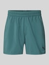 PUMA Performance Regular Fit sportshorts met logoprint model 'TAD ESSENTIALS' Donkergroen