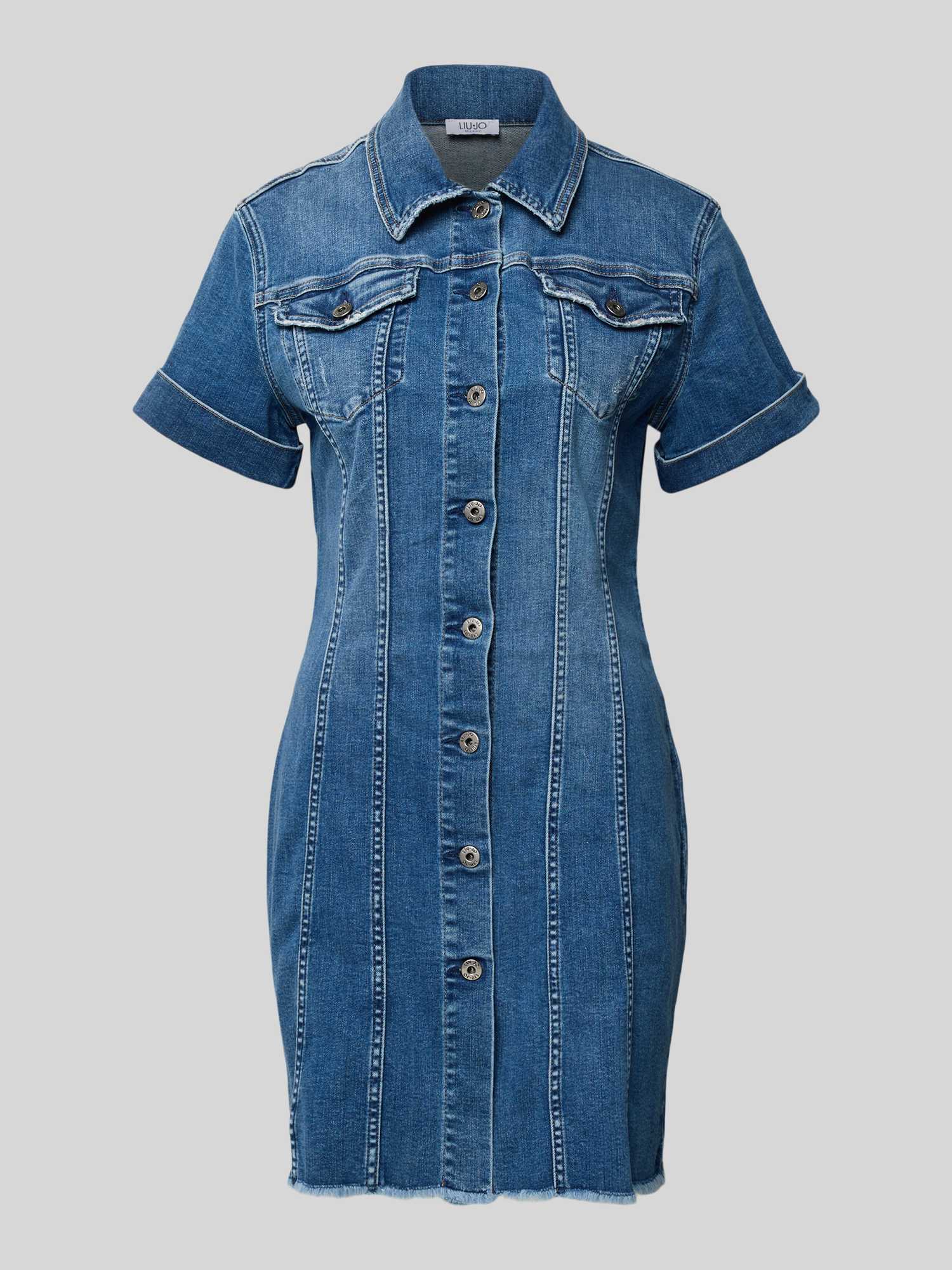 Denimjurk met franjeszoom en knoopsluiting