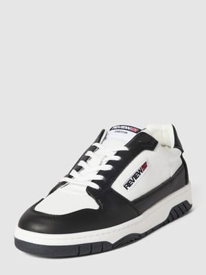 Sneakers met labeldetails Shop The Look MANNEQUINE