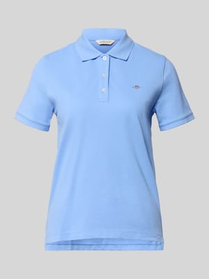 poloshirt met gestikt logo en polokraag Shop The Look MANNEQUINE