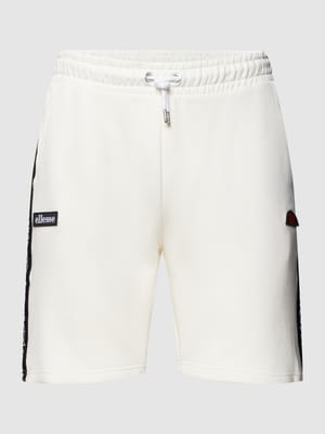 Sweatshorts met contraststrepen en labeldetail, model 'LATION' Shop The Look MANNEQUINE