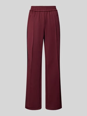 Loose Fit Trackpants mit Kontraststreifen Modell 'WARM UP X' Shop The Look MANNEQUINE