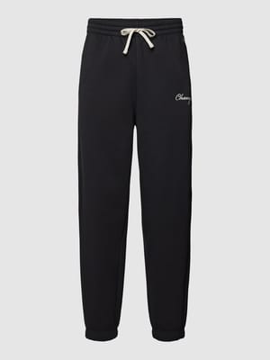 Sweatpants met labelstitching Shop The Look MANNEQUINE