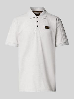 Poloshirt met labeldetail Shop The Look MANNEQUINE