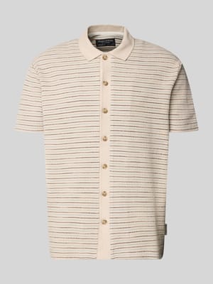 Relaxed Fit Poloshirt aus reiner Baumwolle Shop The Look MANNEQUINE