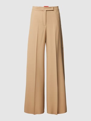 Spodnie materiałowe z lamowanymi kieszeniami z tyłu model ‘CARONTE' Shop The Look MANNEQUINE