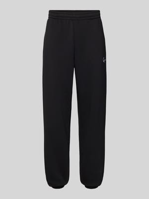 Sweatpants met labelstitching Shop The Look MANNEQUINE