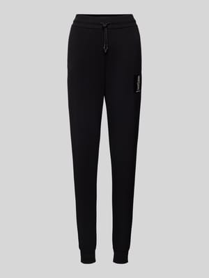 Slim Fit Sweatpants mit Label-Print Shop The Look MANNEQUINE