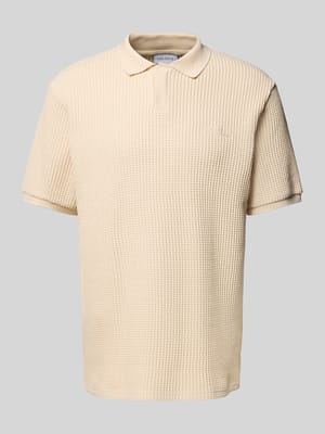 Poloshirt met labeldetail Shop The Look MANNEQUINE