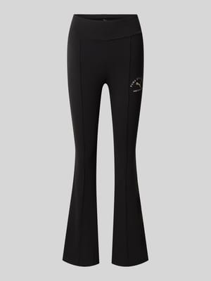 Slim fit bell bottom met labeldetail Shop The Look MANNEQUINE