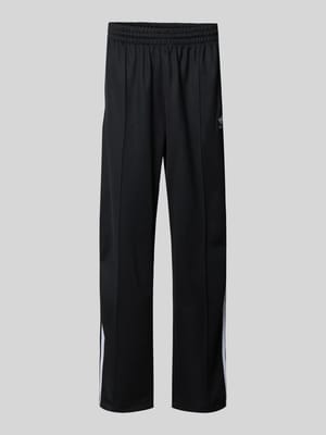 Baggy fit sweatpants met labelstitching Shop The Look MANNEQUINE