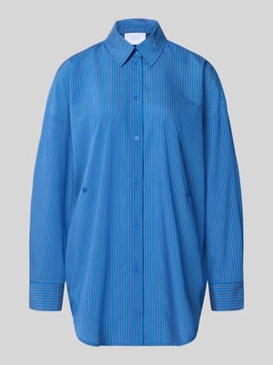 Blouse met strikdetail in koningsblauw - curated by Viky Rader Shop The Look MANNEQUINE