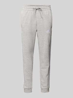 Regular fit sweatpants met labelstitching Shop The Look MANNEQUINE