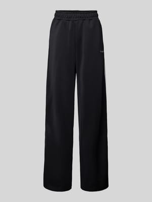 Wide Leg Sweatpants mit Label-Schriftzug Modell 'SIMA' Shop The Look MANNEQUINE