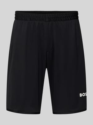 Szorty o kroju regular fit z napisem z logo model "TOC SPIN 9 INCH" Shop The Look MANNEQUINE