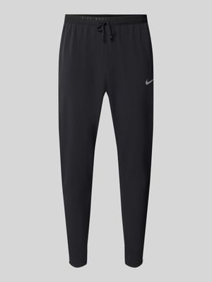 Slim Fit Trainingshose mit Dri-FIT-Technologie Modell 'Stride' Shop The Look MANNEQUINE
