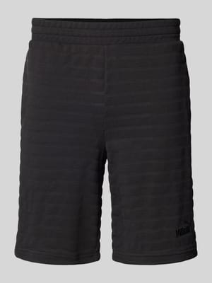 Slim Fit Shorts mit Strukturmuster Modell 'ESS ELEVATED' Shop The Look MANNEQUINE