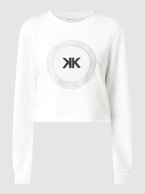 Kort sweatshirt met logo-applicatie  Shop The Look MANNEQUINE