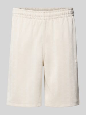 Regular fit sweatshorts met monogram-logoprint Shop The Look MANNEQUINE