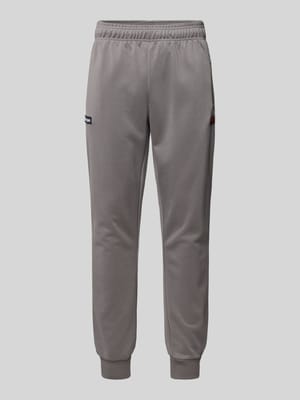 Tapered Fit Trackpants mit Label-Badge Modell 'BERTONI' Shop The Look MANNEQUINE