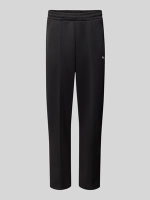 Spodnie dresowe o kroju relaxed fit z domieszką bawełny model 'T7 ALWAYS ON' Shop The Look MANNEQUINE