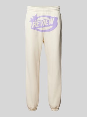 Spodnie dresowe o kroju regular fit z nadrukiem z logo Shop The Look MANNEQUINE