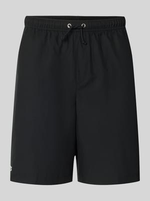 relaxed fit short met logopatch Shop The Look MANNEQUINE