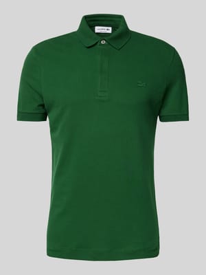 Koszulka polo o kroju regular fit z detalem z logo Shop The Look MANNEQUINE