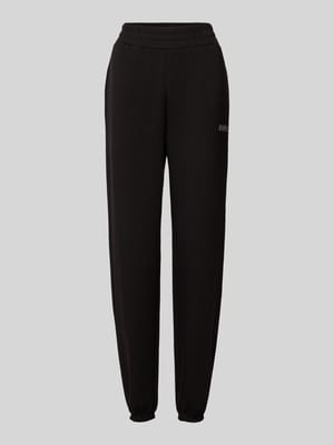 Tapered fit sweatpants met labelprint, model 'CECILIA' Shop The Look MANNEQUINE